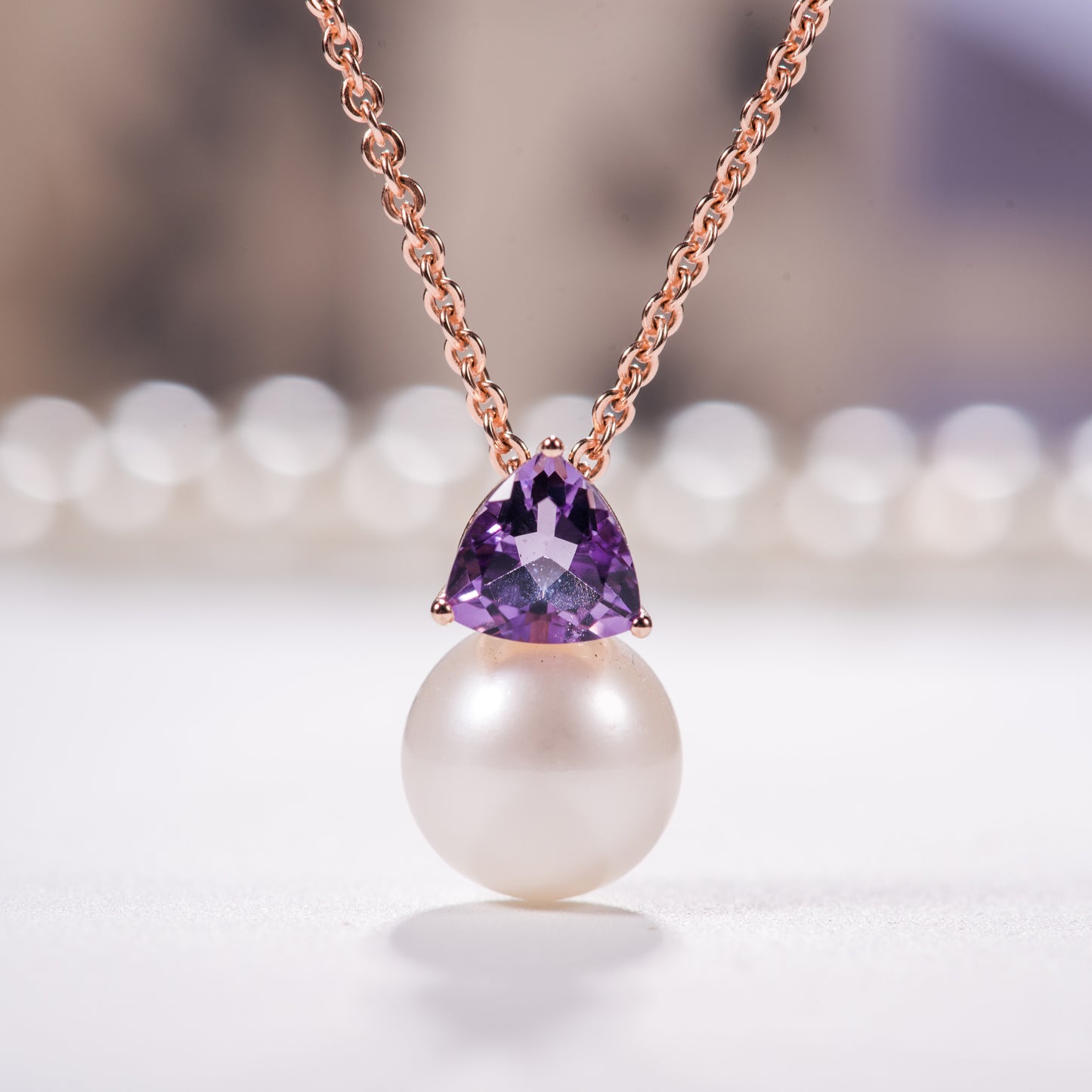 Pearl pendant with amethyst